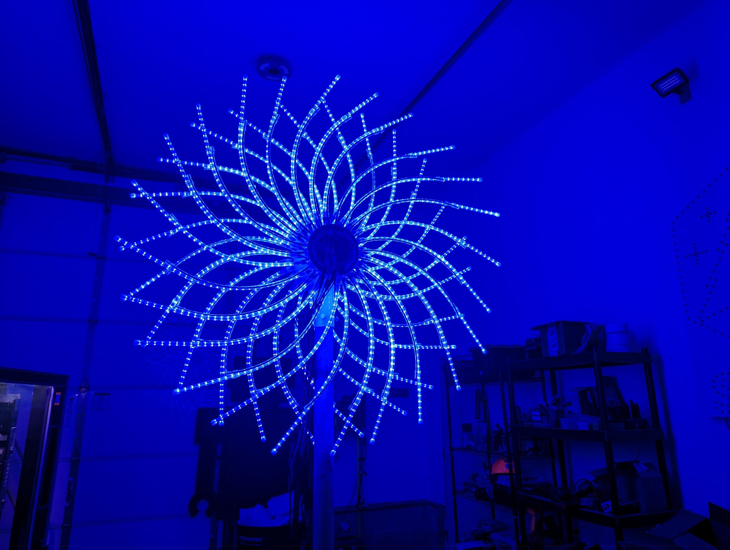 A blue and white custom designed LED Snowflake for the Magical Lights of Lincoln family produced Christmas lights show at the Lancaster Event Center